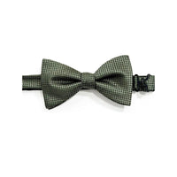 A pre-tied bow tie with a textured, woven geometric pattern in olive green and black, displayed horizontally on a clean white background.