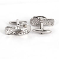 Silver and White Crystal slipper cufflinks featuring a stylish and playful design with shimmering details.