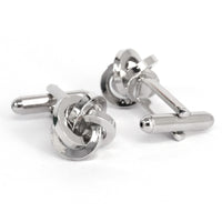 Silver Silk Knot Cufflink displayed, showcasing elegant silver-toned brass design with silk knot detail.