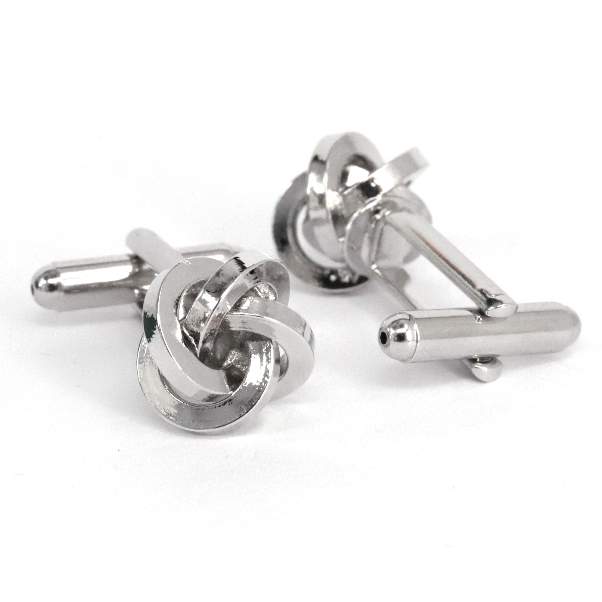 Silver Silk Knot Cufflink displayed, showcasing elegant silver-toned brass design with silk knot detail.