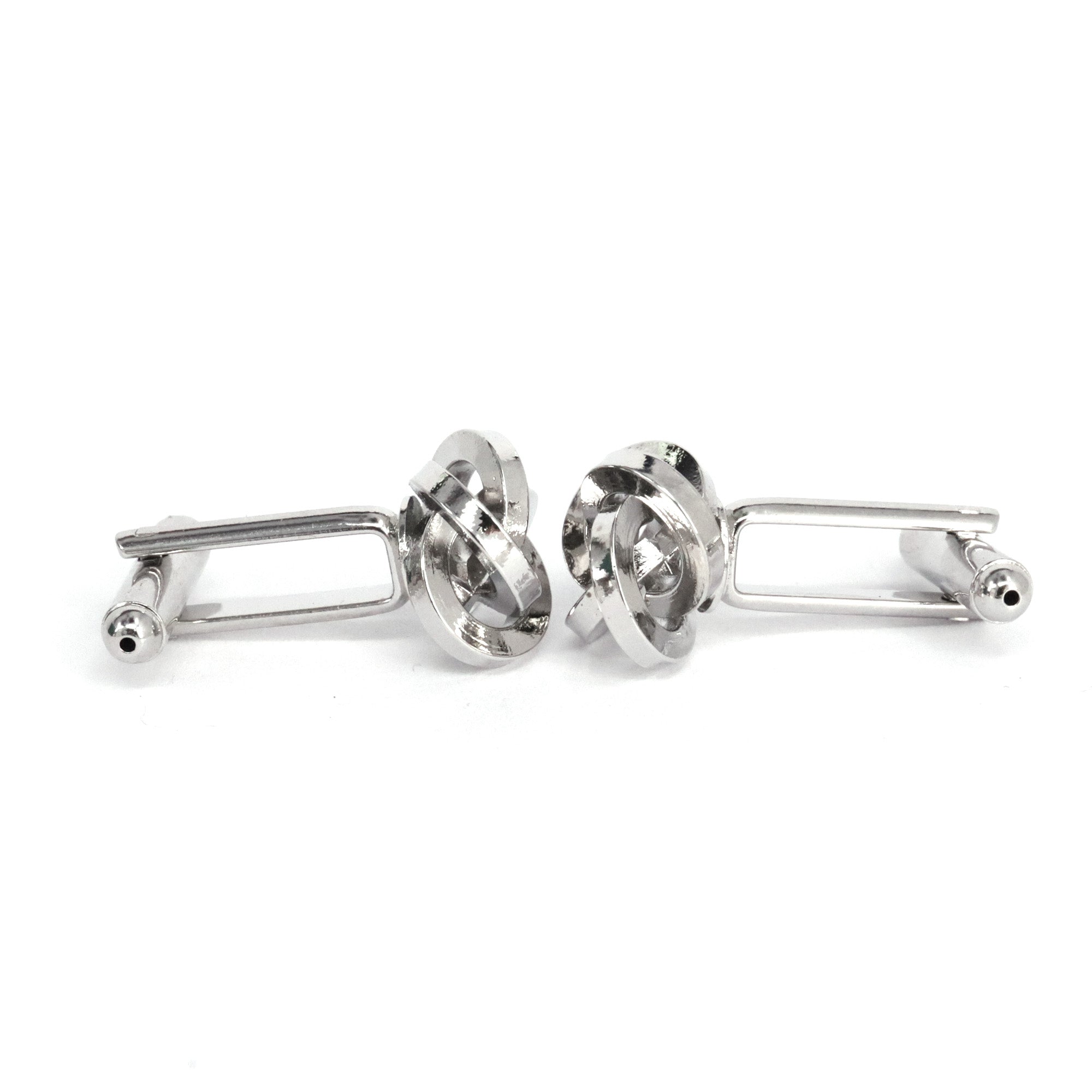 Silver Silk Knot Cufflink showcasing elegant silk knot design in silver-toned brass, perfect for enhancing formal attire.