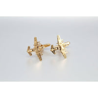 Fighter jet cufflinks in gold, elegant accessory with detailed propellers, perfect for aviation enthusiasts.