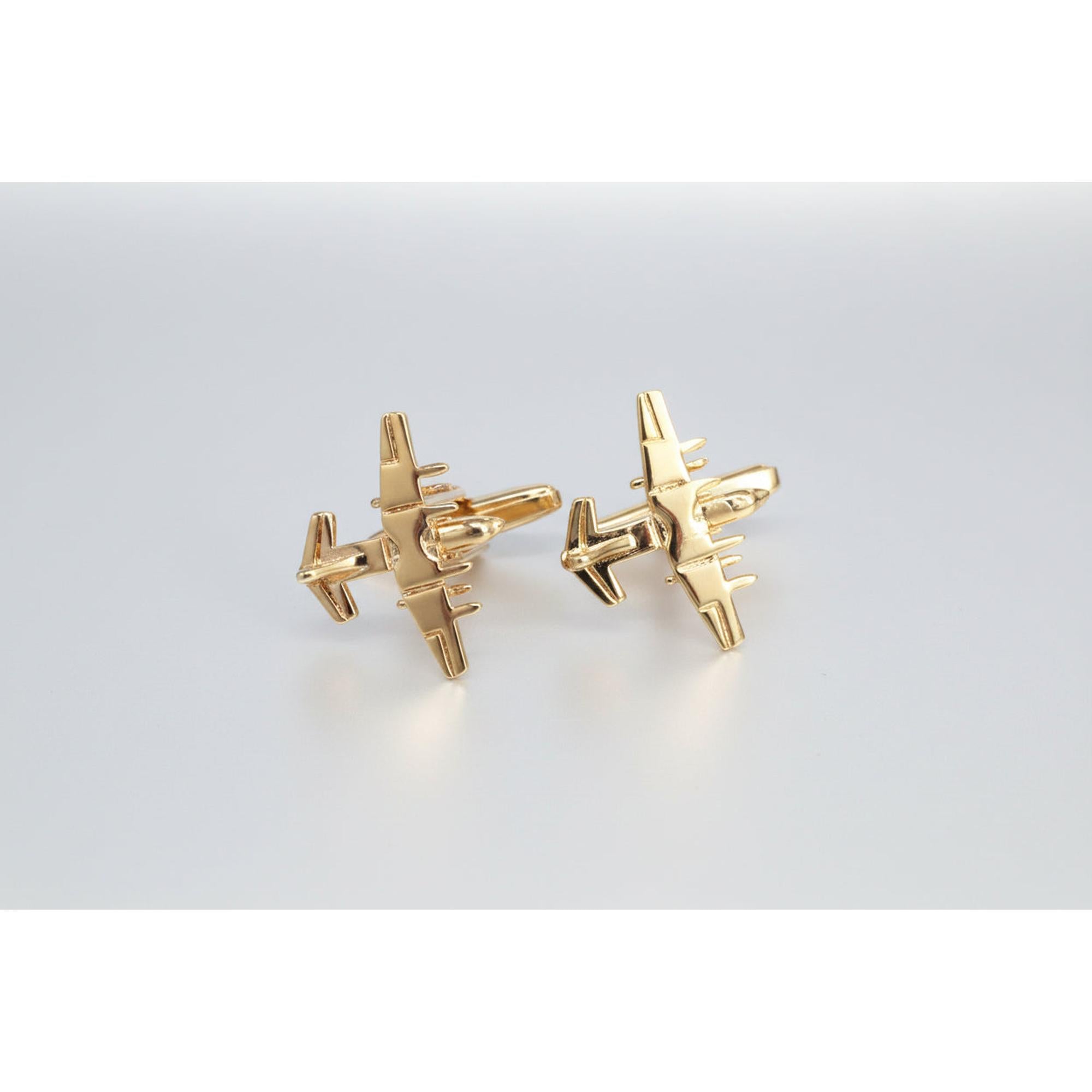 Fighter jet cufflinks in gold, elegant accessory with detailed propellers, perfect for aviation enthusiasts.