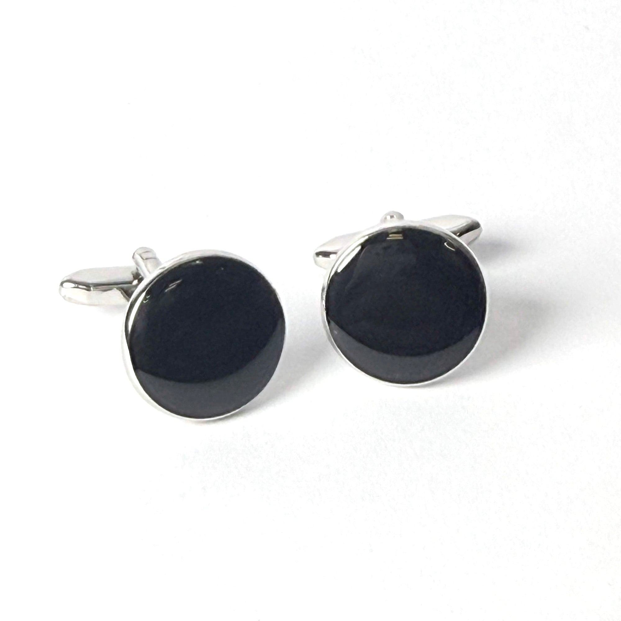 Premium black enamel cufflinks from The Noir Series, perfect for adding elegance to formal attire.