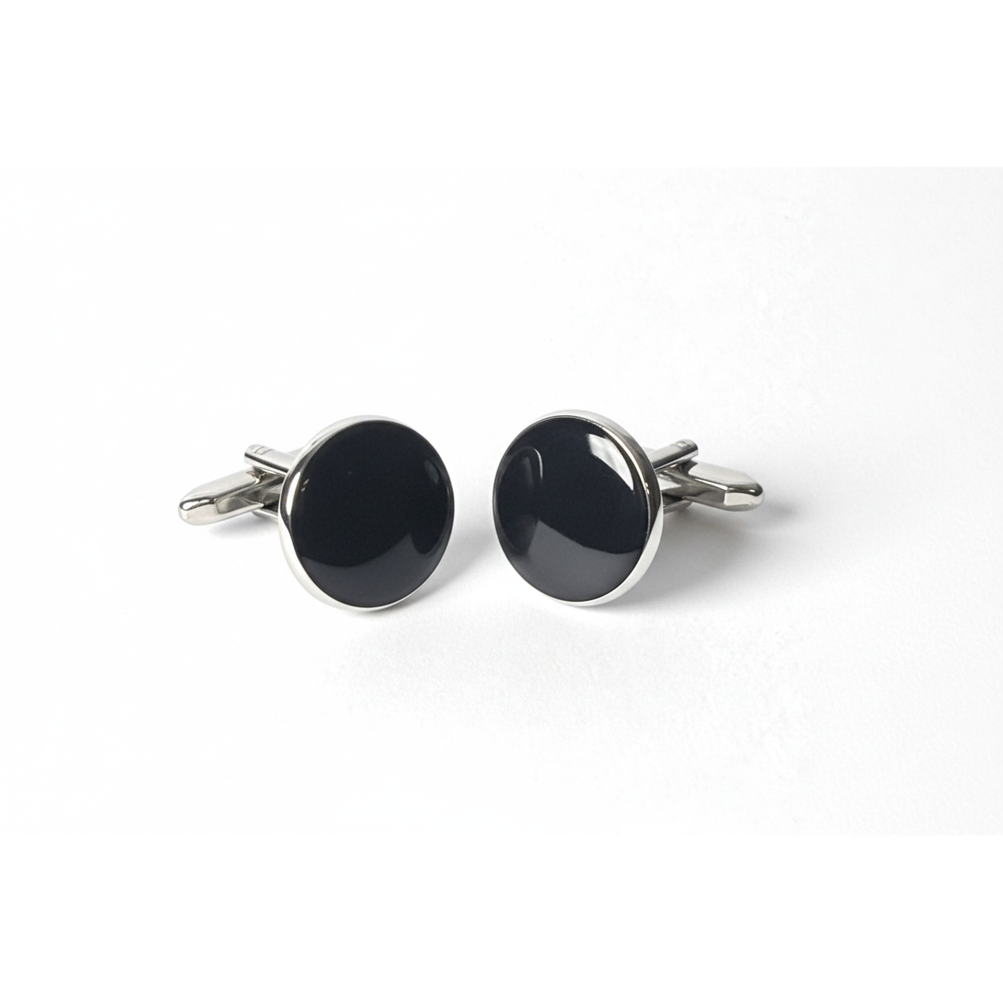 Premium black enamel cufflinks from The Noir Series, perfect for the modern gentleman's formal attire.