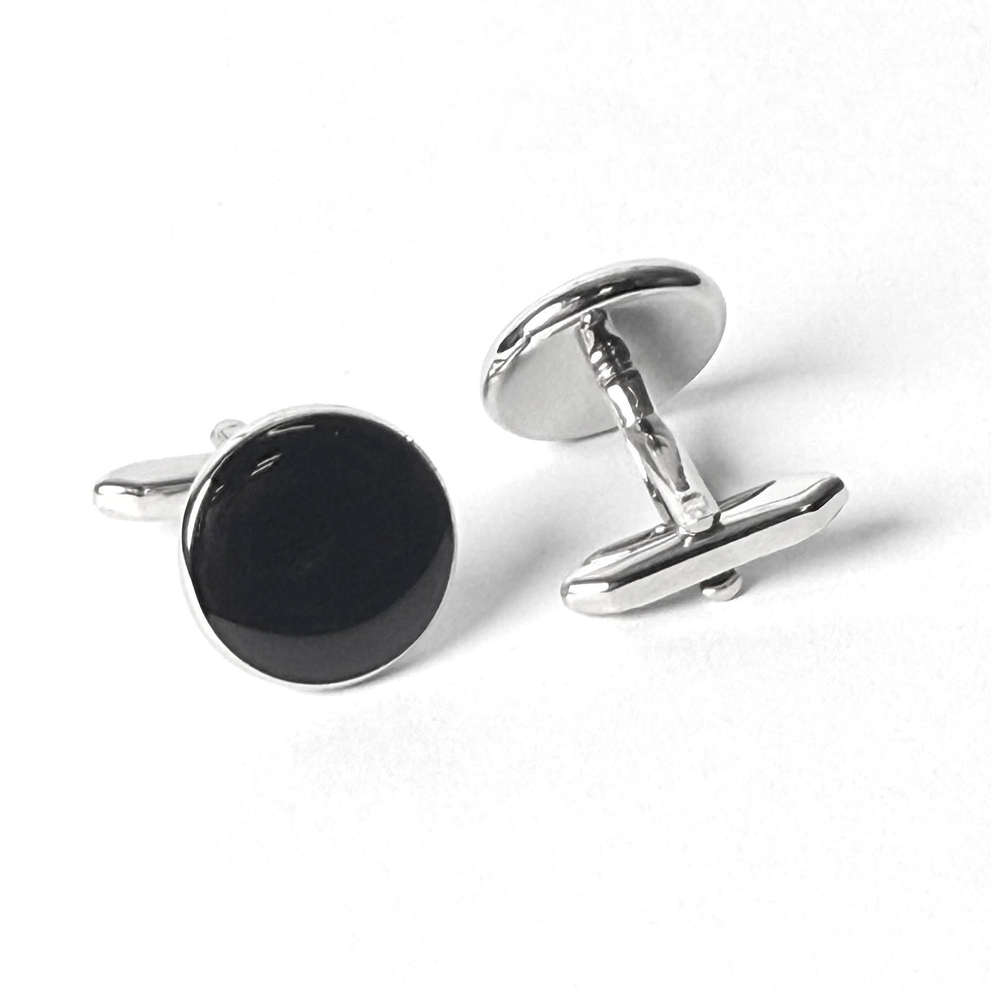 Premium black enamel cufflinks from The Noir Series, a stylish accessory for the modern gentleman.
