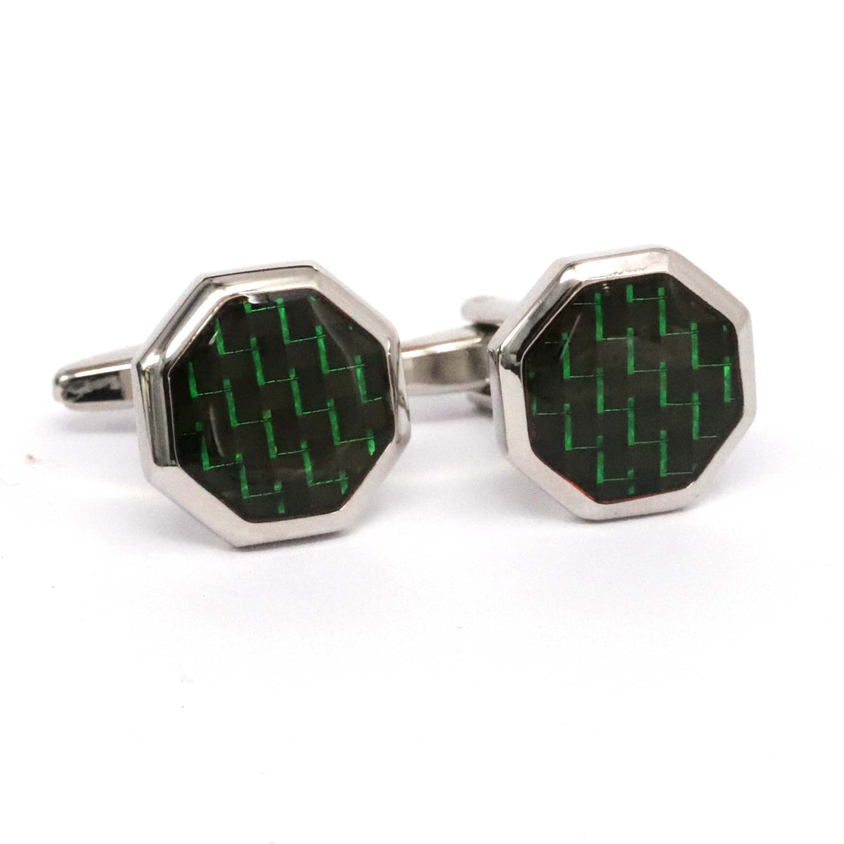 Hexagonal cufflinks with green and black pattern on a white background