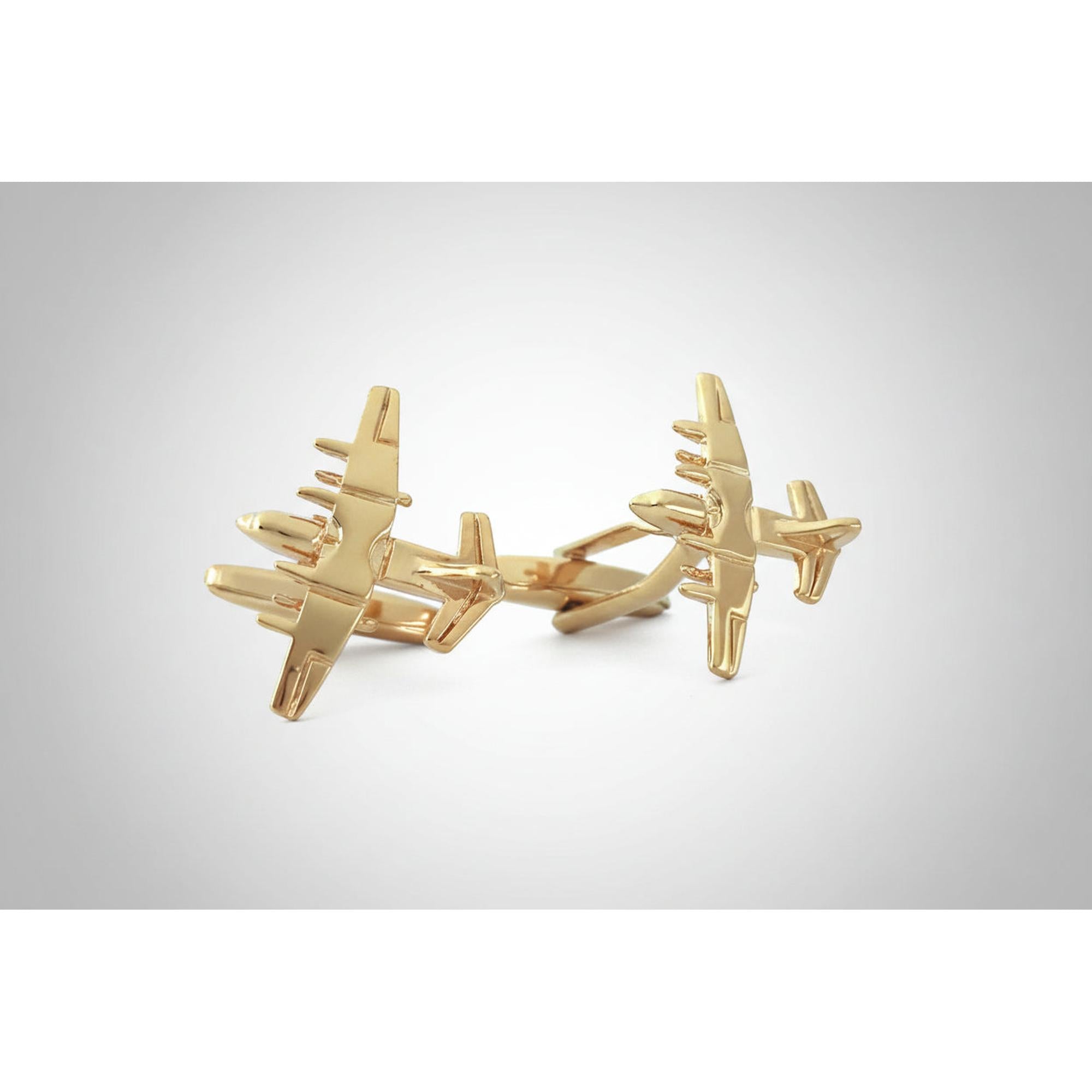 Fighter jet cufflinks in gold featuring detailed aircraft design for stylish outfits and aviation enthusiasts.