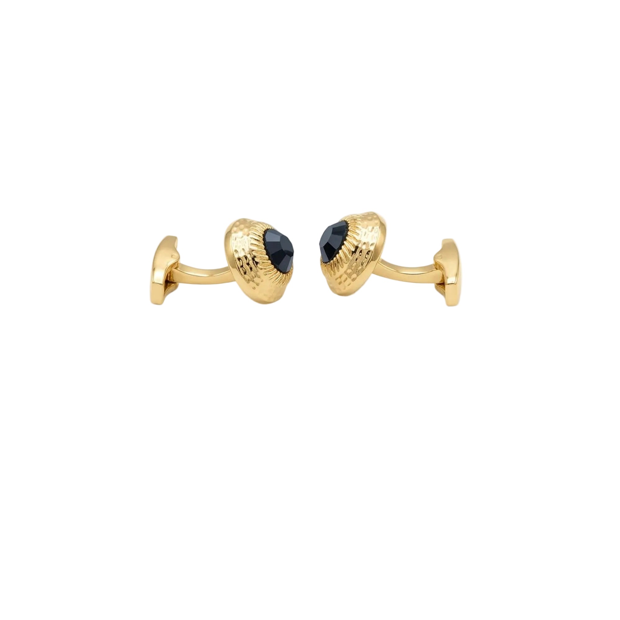 A pair of gold cufflinks with textured dome-shaped fronts and faceted black oval centers, shown on a clean white background.