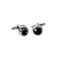 Pair of silver cufflinks with blue gemstones 