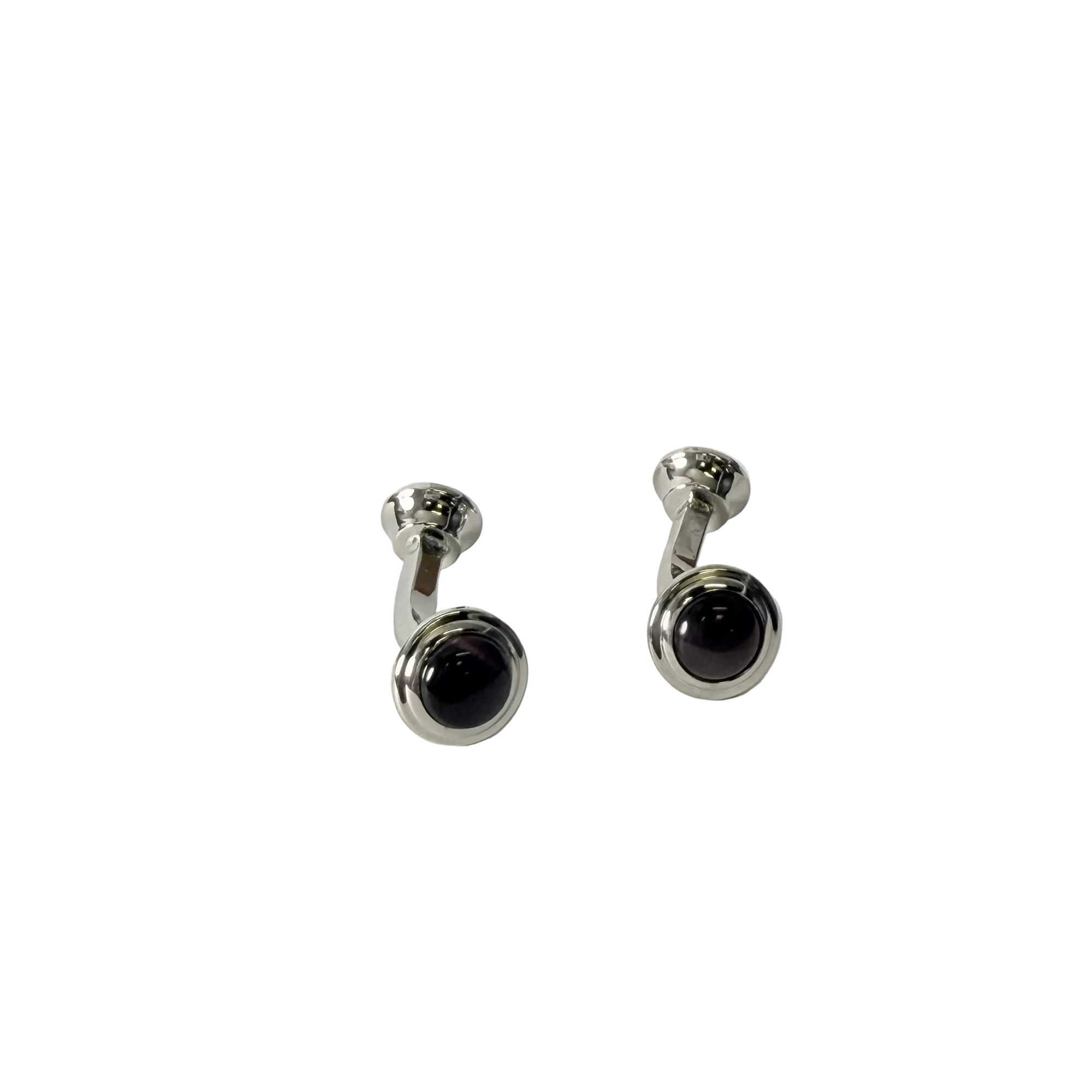 A pair of silver-toned cufflinks with round Brown fiberglass