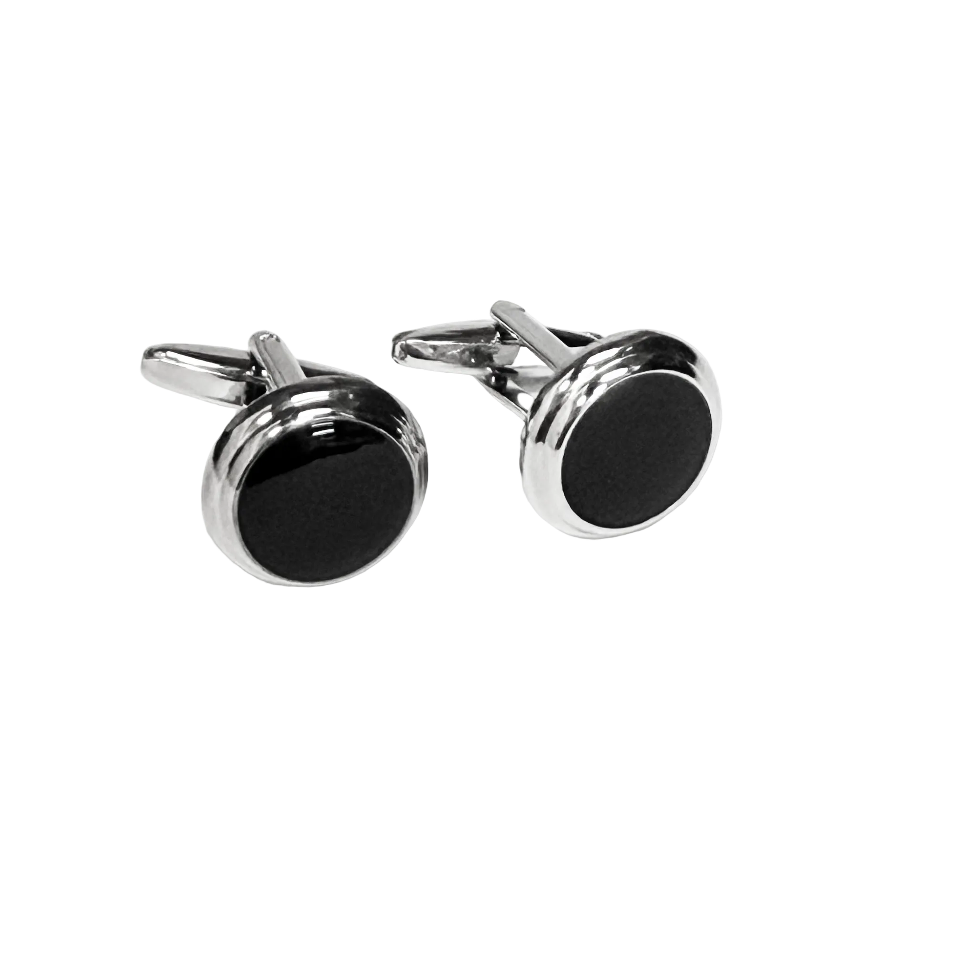 Pair of silver cufflinks with black circular stones on a white background