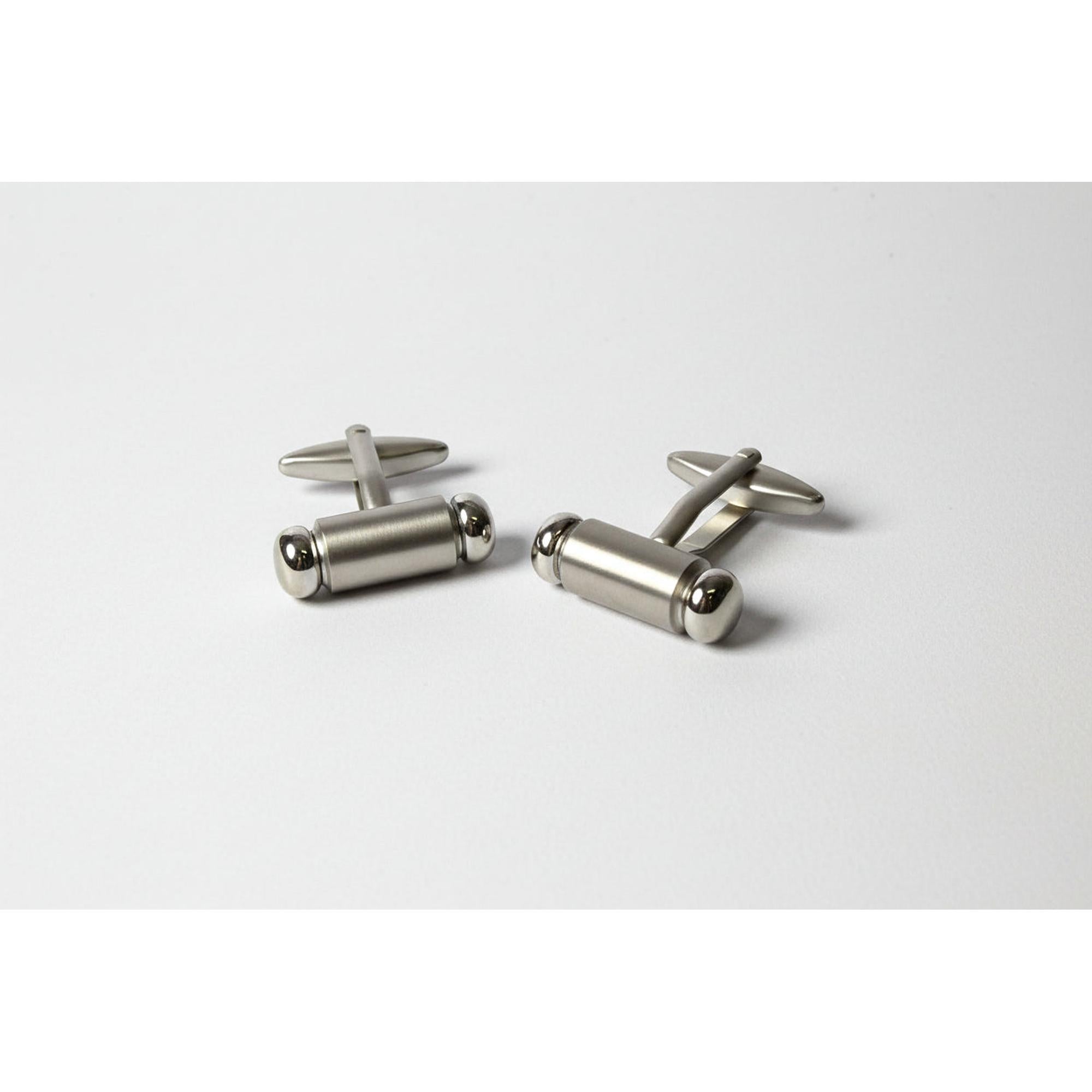 Premium men's cufflinks featuring a sleek silver design, perfect for enhancing formal attire.