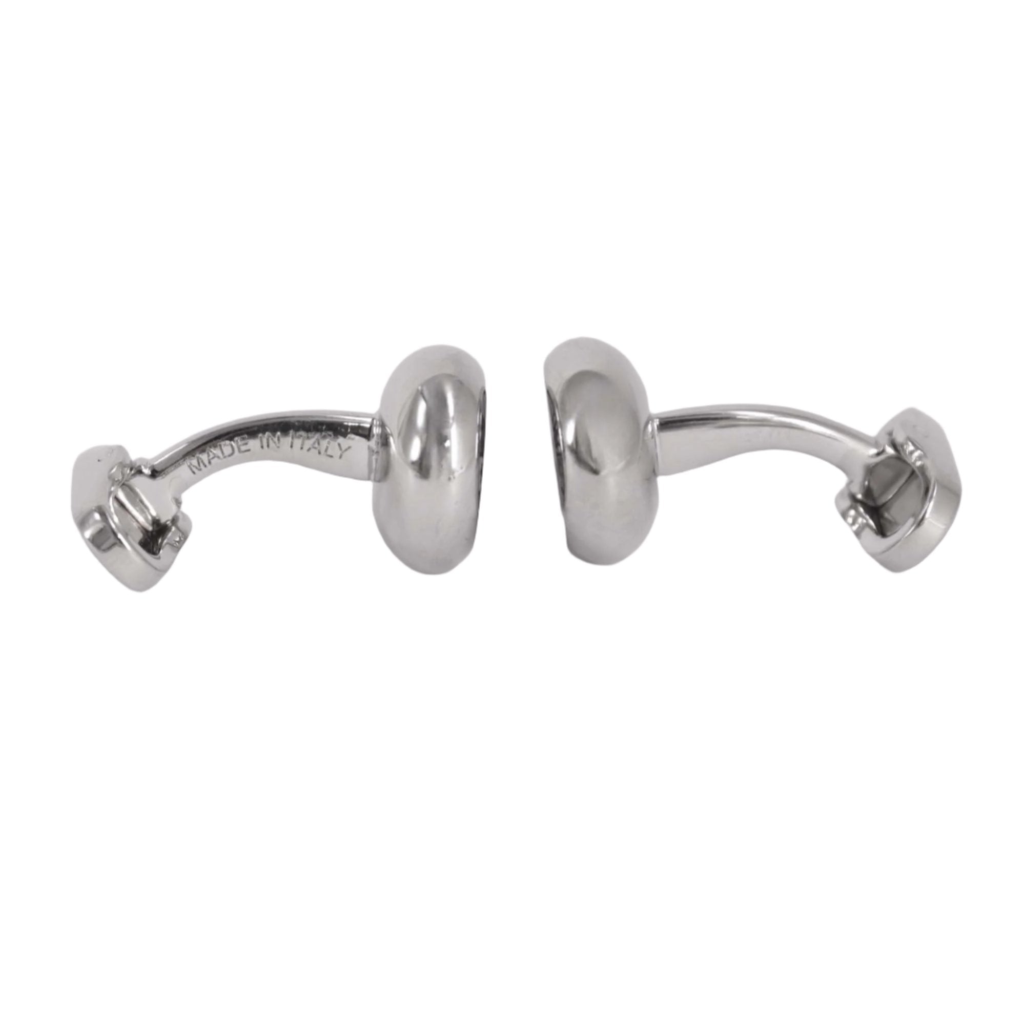 Designer cufflinks made of polished metal, showcasing elegant Italian craftsmanship, perfect for formal attire.