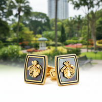 Premium cufflinks inspired by Vanda Miss Joaquim showcased in a beautiful park setting.