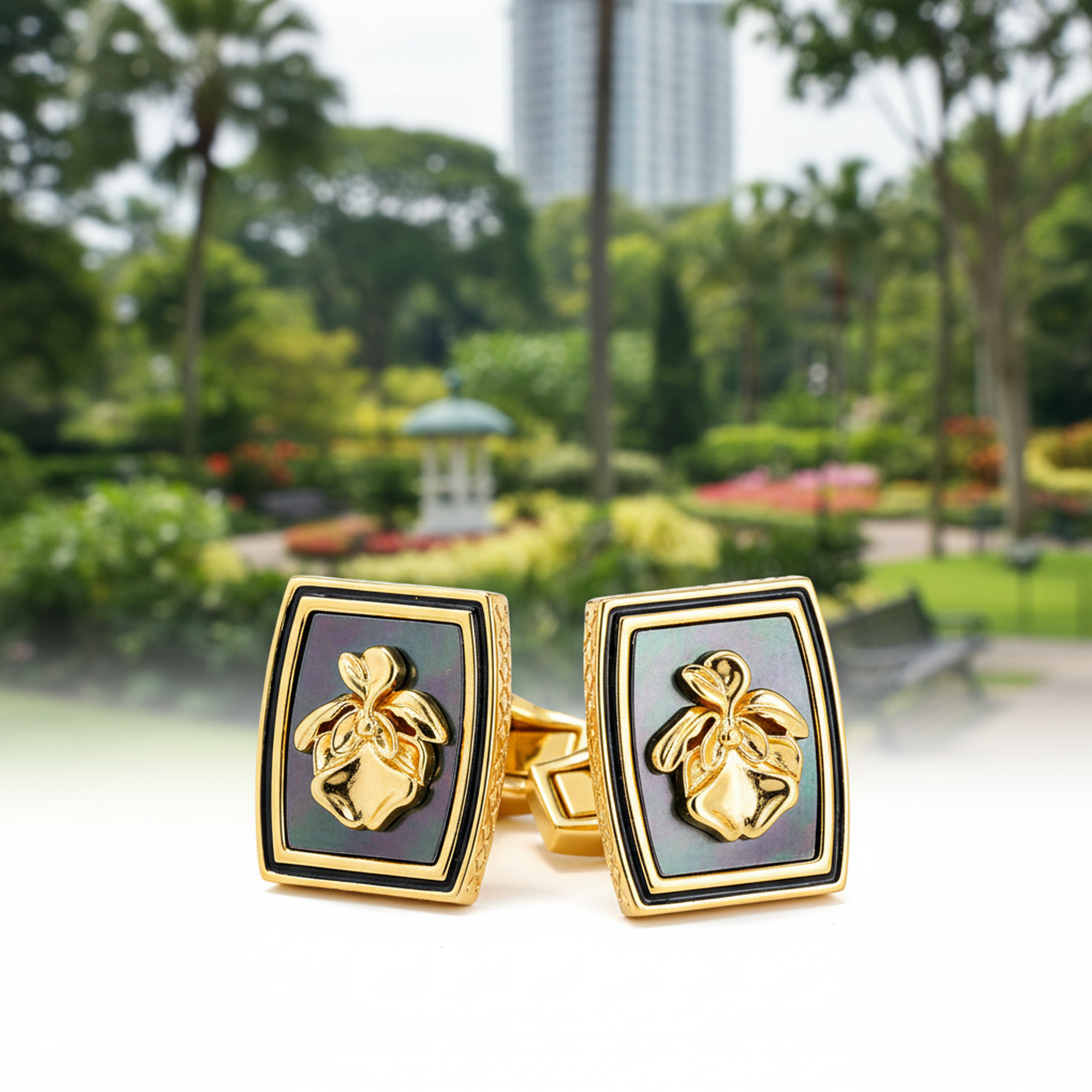 Premium cufflinks inspired by Vanda Miss Joaquim showcased in a beautiful park setting.